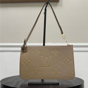LOUIS VUITTON Turtle Dove Monogram Giant Empreinte Leather Neverfull  Clutch Bag